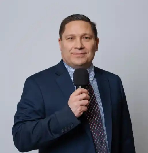 Kyle Patrick Smith speaking at an event